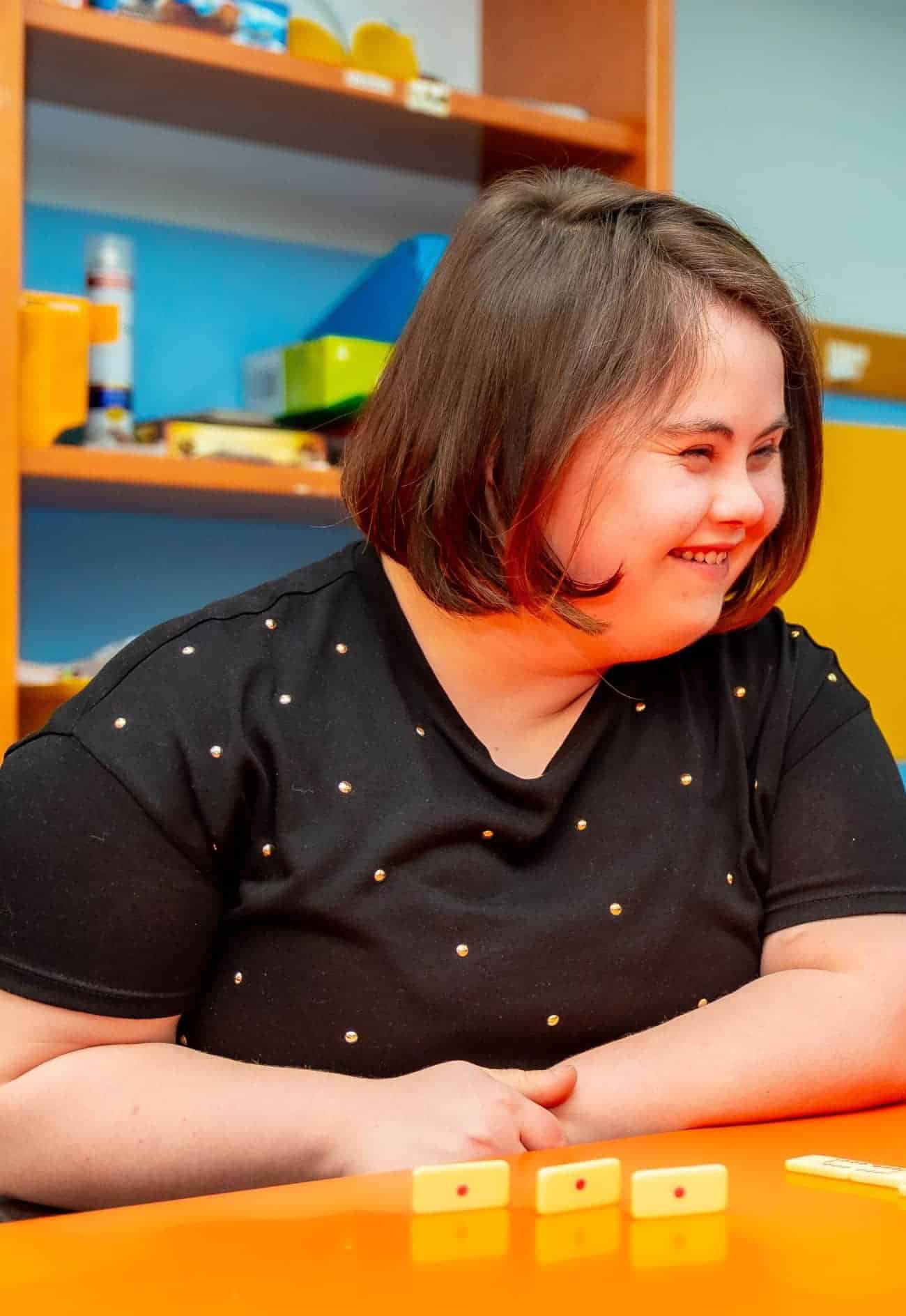 woman-with-down-syndrome-and-disabled-man-playing-1